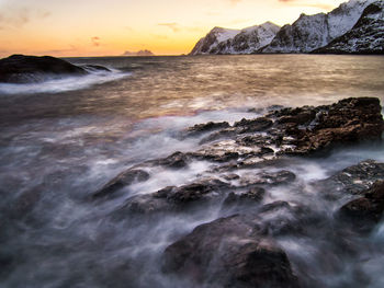 Scenic view of sea against sky during sunset