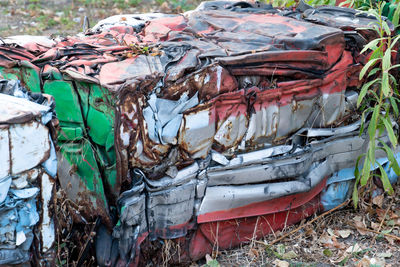 Abandoned rusty pressed piece of car