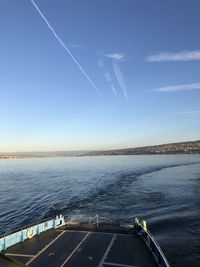 Scenic view of sea against blue sky