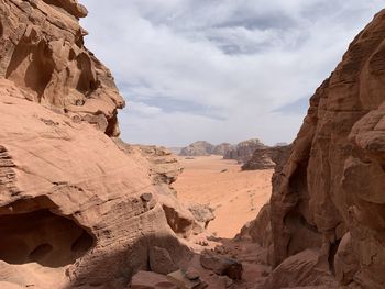 Rock formations in desert against sky