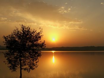Scenic view of sunset over river