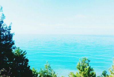 Scenic view of calm sea against sky