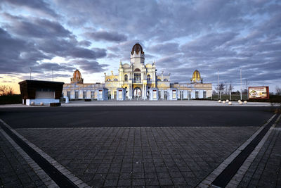 View of building against cloudy sky