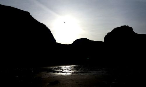 Silhouette of mountain at sunset