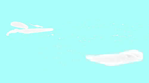 Close-up of water splashing against blue background