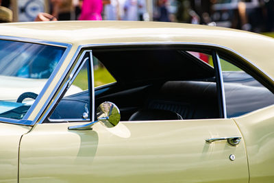 Reflection of man on car window