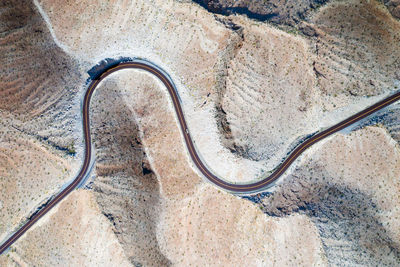 High angle view of snake on rock