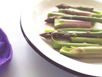 High angle view of chopped vegetables in plate on table