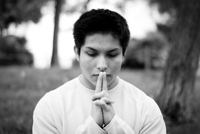 Portrait of man smoking cigarette