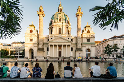 View of people outside cathedral against clear sky