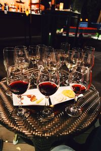 Close-up of wine glasses on table