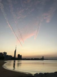 Scenic view of sea against sky at sunset