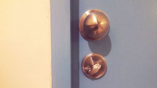 Directly above shot of metal door on table