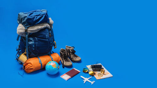 High angle view of stuffed toy against blue background