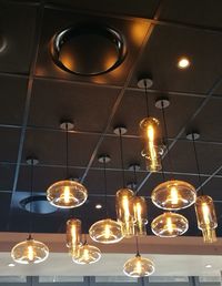 Low angle view of illuminated light bulb