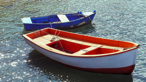 High angle view of boat moored in water