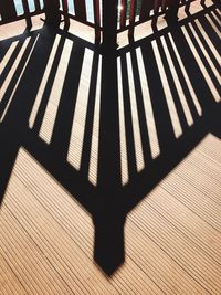 Low section of shadow on wood