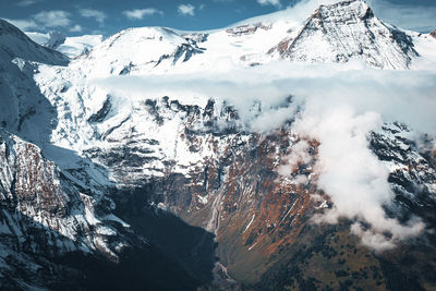 Scenic view of snowcapped mountains during winter