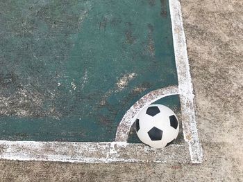 High angle view of soccer ball on wall