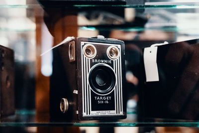 Close-up of hand holding camera