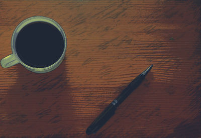 High angle view of coffee cup on table