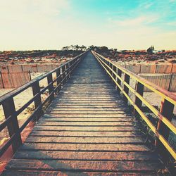 Railroad track against sky