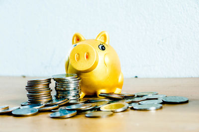 Close-up of coins on table