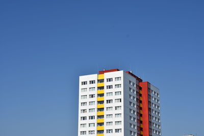Residential district against blue sky