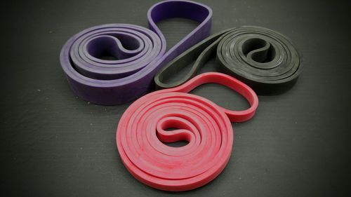 High angle view of rubber curled up on table