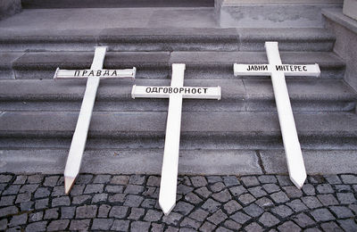 Close-up of crosses on steps 