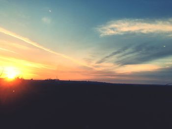 Scenic view of silhouette landscape against sky during sunset