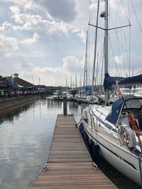 Boats moored at harbor