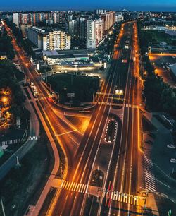 High angle view of light trails on road at night