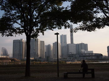 Modern buildings in city against sky