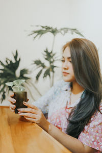 Young woman looking at camera