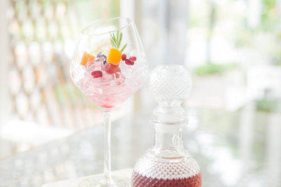 Close-up of ice cream on glass table