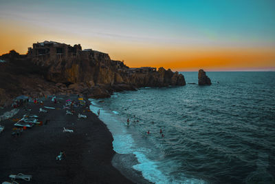 Scenic view of sea against sky during sunset