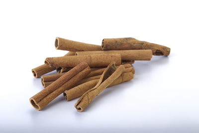 High angle view of bread against white background