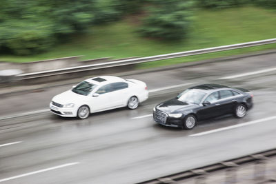 Blurred motion of car on road