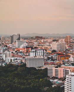 High angle view of cityscape against sky at sunset