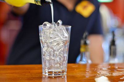 Close-up of beer glass on table