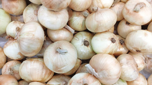 Full frame shot of onions for sale at market stall