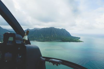 Scenic view of sea against cloudy sky