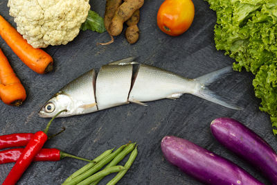 High angle view of chopped vegetables on cutting board