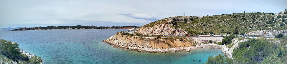 Panoramic view of bay against sky