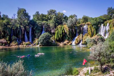 Panoramic view of lake against trees