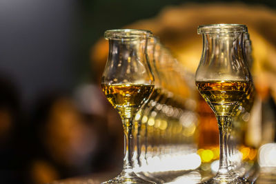 Close-up of wineglass on table