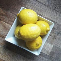 High angle view of fruits in bowl on table