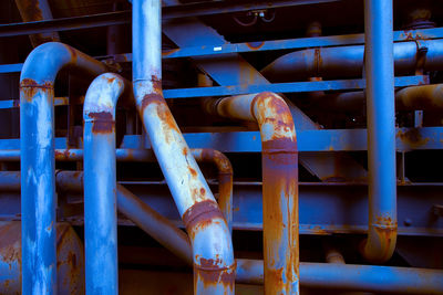 Full frame shot of metal pipes in factory