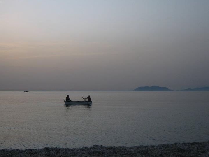 VIEW OF BOATS IN SEA